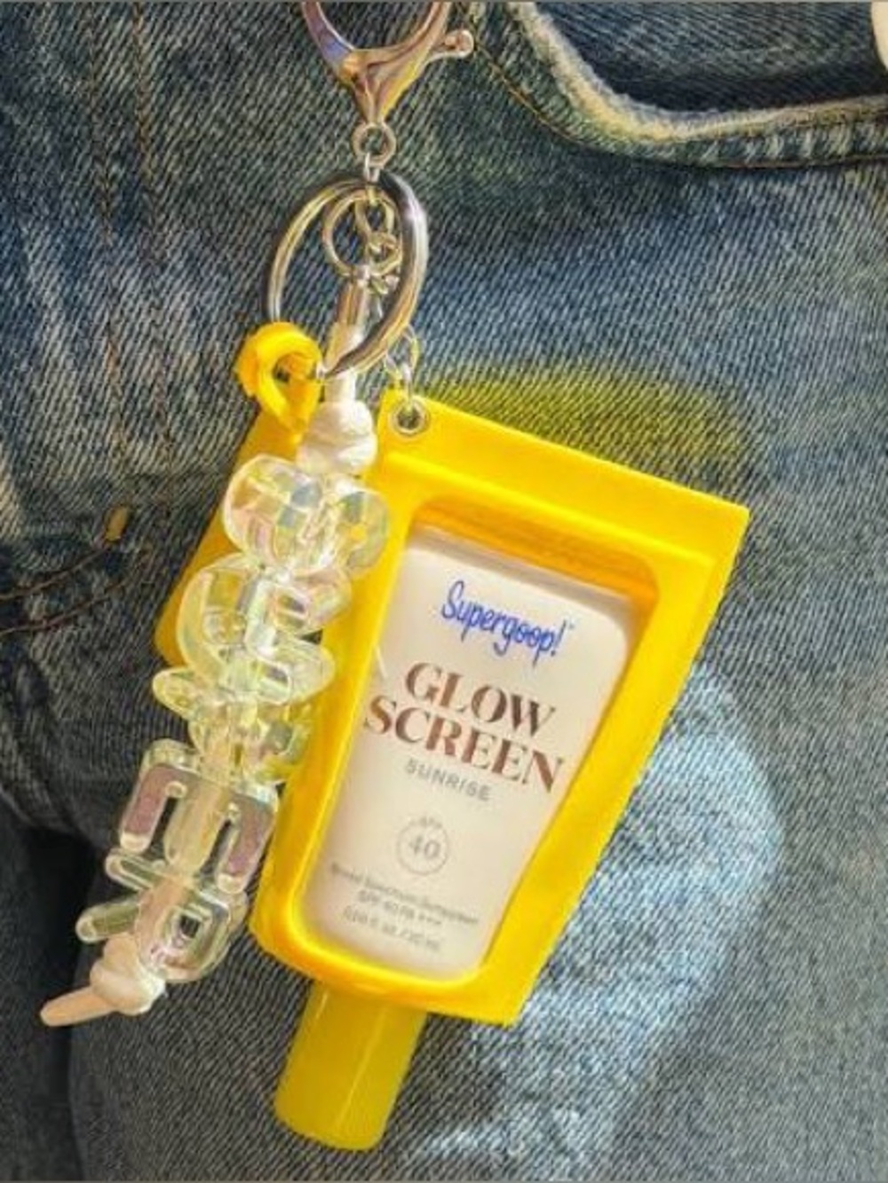 Supergoop! Yellow Glow Screen Keychain Holder with Clear Bead Charm